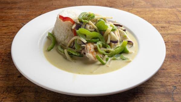 Spicy Green Curry (Dinner) · Eggplant, bamboo shoots, shiitake mushroom, chili pepper, bell pepper, and fresh Thai basil over brown or Japanese rice.