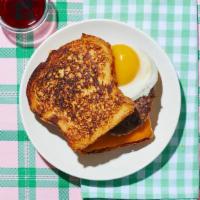 Le Sausage, Egg, And Cheese French Toast Sandwich · So good, it’ll have you wondering why the Eiffel Tower isn’t made out of sausage links. Saus...