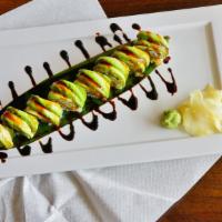 Dragon Roll · Fresh eel and cucumber inside with avocado on top.