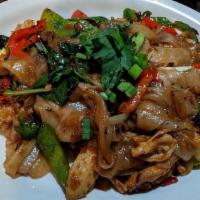 Pad Kee Mao · Sautéed flat rice noodles stir fried with basil leaves, onions, bell pepper and hot chili pa...