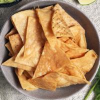 Chips And Salsa · Freshly made corn tortilla chips w/ avocado tomatillo salsa
