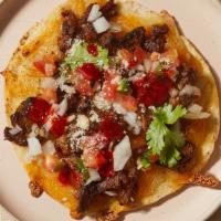 Al Pastor Quesadilla · Thinly sliced Al Pastor Berkshire pork, melted Oaxaca cheese and topped with your choice of ...