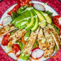 Avocado Salad With Chicken · Romaine lettuce, tomato,cucumber, carrots, and house dressing.