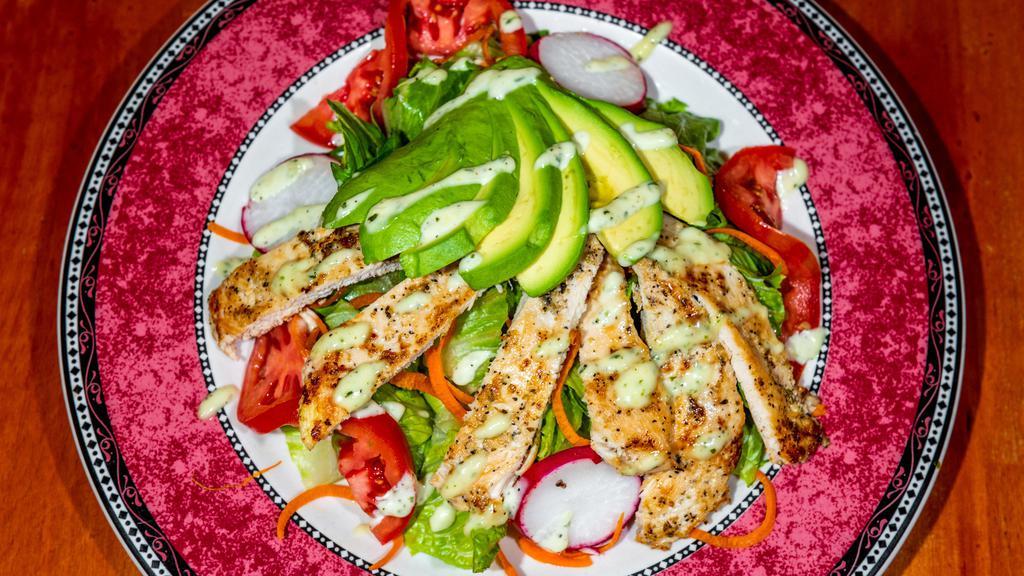 Avocado Salad With Chicken · Romaine lettuce, tomato,cucumber, carrots, and house dressing.