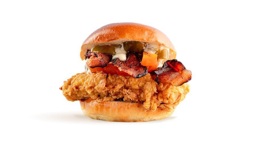 Spicy Ranch · buttermilk-fried, all-natural chicken, smoked bacon, organic tomatoes, pickled jalapeños, mike’s hot honey, chipotle buttermilk ranch, brioche bun (995 cal)