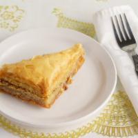 Baklava · A delicious middle eastern pastry, made of nuts baked between layers of thin dough and stepp...