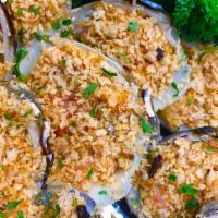 Clams Stuffed With Crab 🦀  · Chopped cherry stone clams stuffed with our gluten and lactose free crab stuffing made up en...
