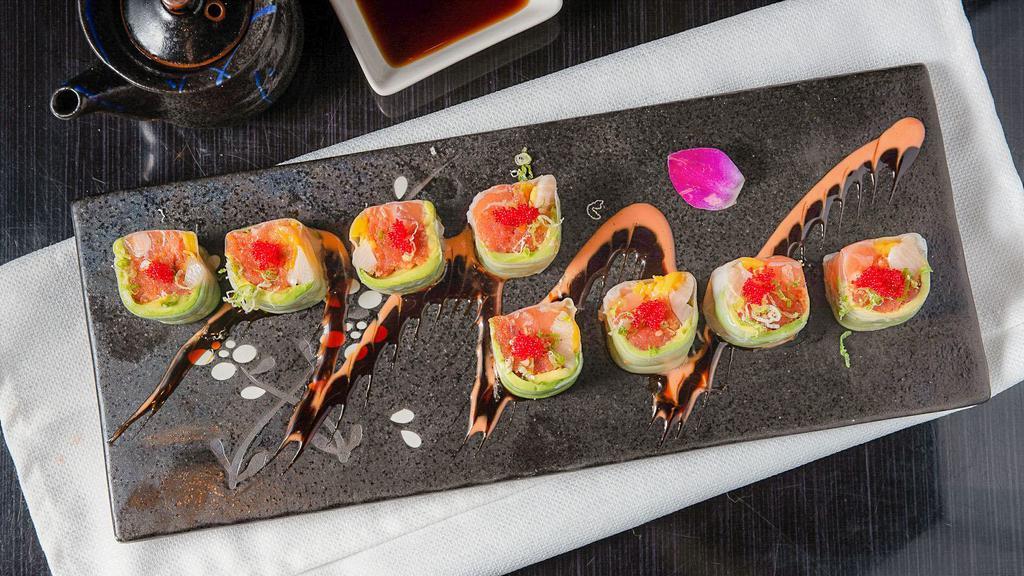 Angel Roll · Salmon, yellow tail, spicy tuna, mango and avocado inside, wrap with rice paper (no rice).