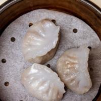 Chou Zhou Dumplings · Includes minced pork, mushrooms & peanuts
