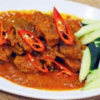 Indonesian Rendang 仁当咖喱 · Spicy. Aromatic house blend curry infused with chili paste, shallots and lemongrass. Served ...