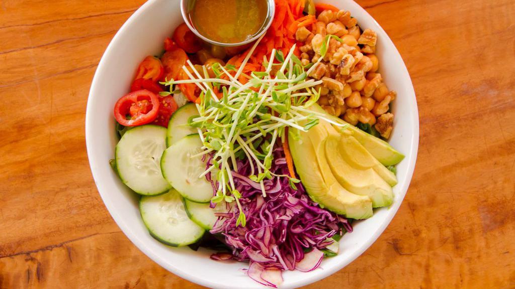 Buddha Bowl · Mixed greens, tomato, cucumber, red cabbage, carrot, chickpeas, avocado, walnuts.

HAS NUTS