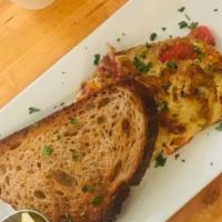 Veggie Omelet · Veggies include spinach, tomato, bell pepper, zucchini and onion. Served with a slice of toast