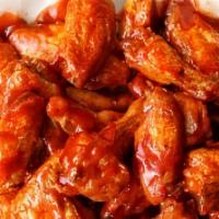 Buffalo Wings · Chicken wings are breaded and fried then tossed in buffalo sauce.