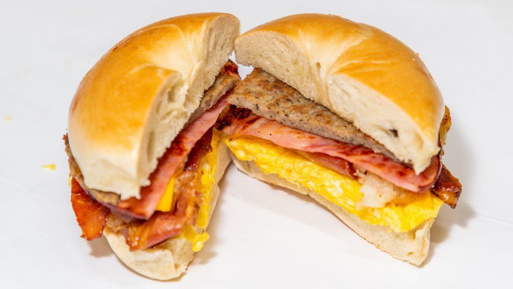 Big Breakfast Sandwich · 2 Eggs (any style), Hash Brown, Ham, Sausage, Bacon, and Cheese.