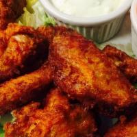 Buffalo Wings · Hot and spicy or barbeque served with bleu cheese.