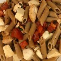 Penne Madeira · Pieces of chicken, diced fresh mozzarella and fresh tomatoes, sautéed in a brown wine sauce.