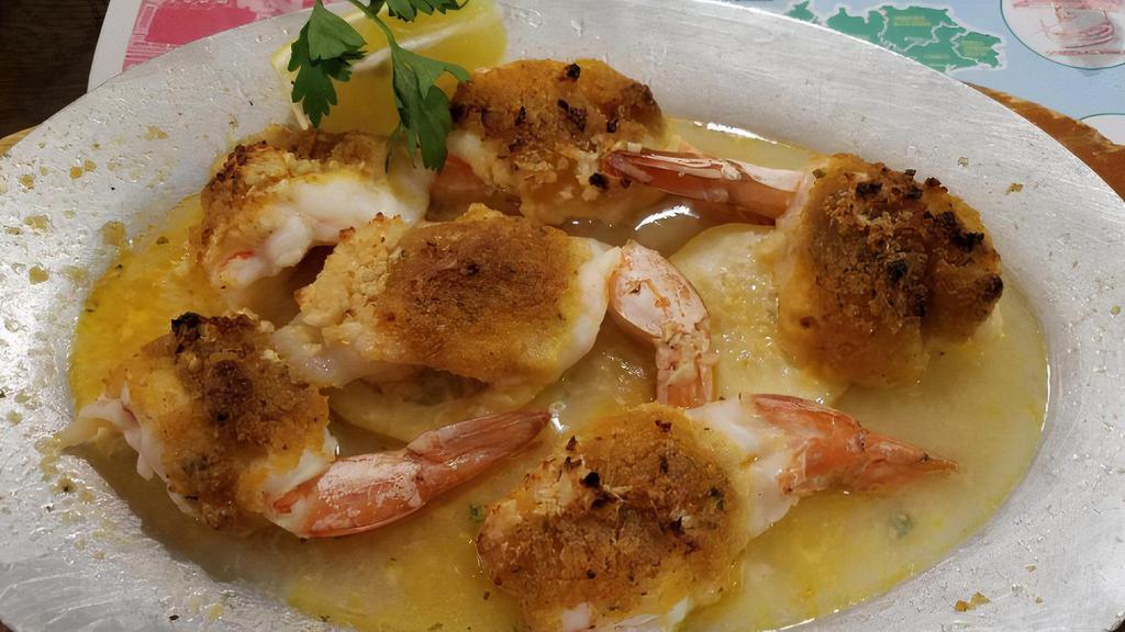 Shrimp Oreganata · Fresh shrimp topped with Italian style home-made seasoned bread crumbs, broiled in a garlic and oil scampi sauce (6 per order).