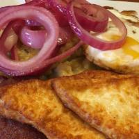 Dominican Tres Golpes · Traditional Dominican Breakfast - Fried Salami, fried eggs, fried cheese, mangú topped with ...