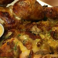 1/4 Chicken And 2 Regular Sides Combo · Comes with 1 garlic mojo sauce and 1 spicy green sauce.