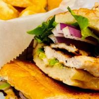 Chicken Sandwich · Grilled chicken breast, sliced avocado, red onion, lettuce, orange vinaigrette on Cuban bread.