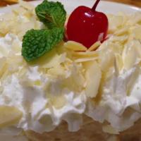 Tres Leches · Yellow cake soaked in three kinds of milk.