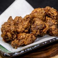 Crispy Chicken Bites · Bell & Evans boneless chicken fried up and marinated in our original house brine. Tossed wit...