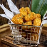 Sea Salt Tots · Crispy tater tots seasoned with sea salt and freshly ground black pepper.