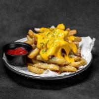 Cheese Fries · Crispy hand-cut fries with our homemade cheese sauce.