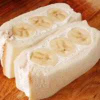 Organic Banana Cream Sando · Organic bananas, house-made organic whipped cream, La Tour Japanese Milk Bread