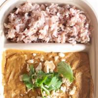 Butter Chicken Curry · Mild Indian-inspired curry with chicken breast and organic spices. Topped with fresh cilantr...