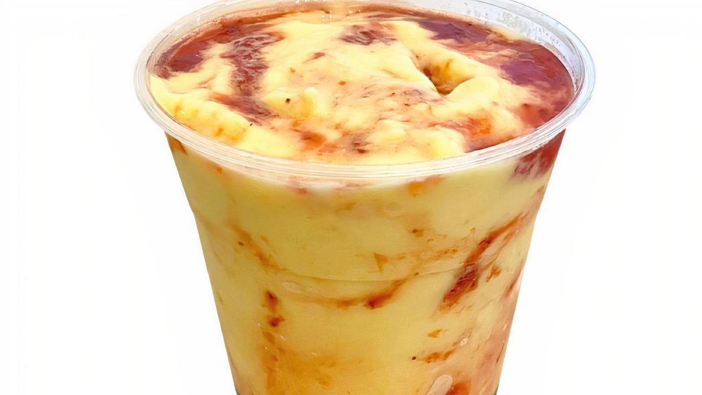 Tropical Coco Bloom / Lava Flow · Fresh organic mango pina colada, with organic pineapple, organic mango, organic banana, and organic coconut milk. With option to make a Lava Flow with our housemade organic strawberry jam.