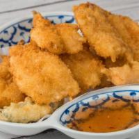 Shrimp Tempura · (6) golden fried shrimp and vegetables in tempura batter, served with sweet and sour sauce.