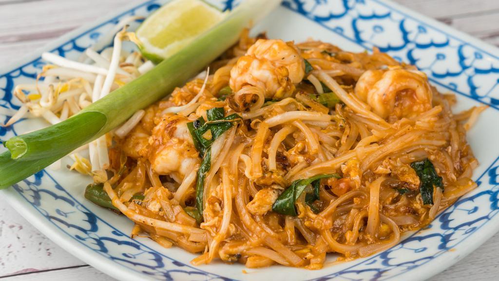 Pad Thai · Thai favorite noodle dish specially prepared with rice noodles, stir fried with egg, bean sprouts, tofu, and scallions.
