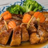 Tamarind Ginger Duck · Sliced boneless roasted duck lightly battered, deep fried and topped with honey soy sauce, t...