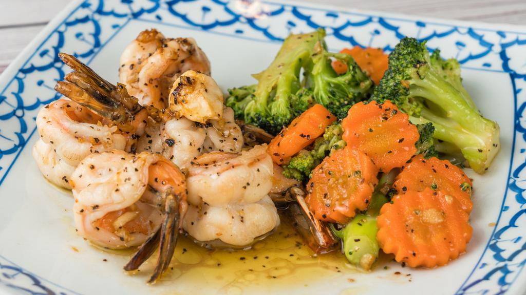 Jumbo Shrimp Garlic · Grilled marinated jumbo shrimp sautÃ©ed and flavored with garlic sauce, served with steam broccoli and carrots.