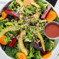 Super Food Salad · Baby kale, broccoli, shaved beet, carrot, edamame, shaved brussels sprouts, avocado, blueber...