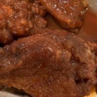 Buffalo Wings (8) · With our special homemade wing sauce mild or spicy.