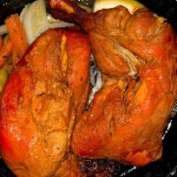 Chicken Tandoori · Half spring chicken, marinated with authentic Indian spices and yogurt. Grilled in clay oven.