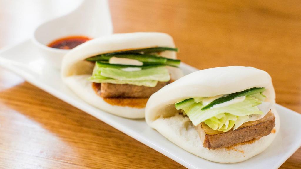 Pork Buns · Two pieces. Roasted pork belly on a steamed bun with original sauce and mayo.
