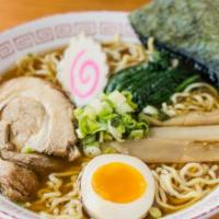 Shoyu · Soy sauce flavored chicken broth, roasted pork, egg, bamboo shoots, spinach, fish cake, scal...