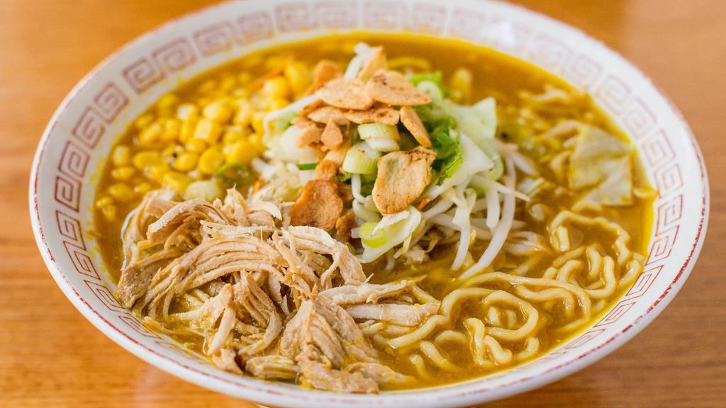 Miso · Soy bean paste chicken broth, roasted chicken, bean sprouts, cabbage, crispy garlic, scallions, corn, egg, and red pepper flakes.