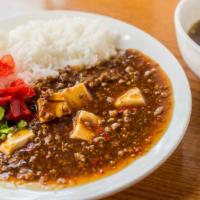 Mabo Don · Stir fried ground pork and tofu in a spicy sauce over rice.
