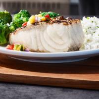 Chilean Sea Bass · Lightly seasoned and wood-grilled and served with choice of two signature sides