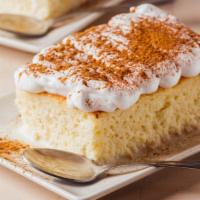 Tres Leches Cake · Decadent cake prepared with three rich milks.