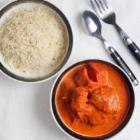 Tikka Masala · Cream of tomato sauce with herbs and spices. Served with steamed basmati rice. Gluten-free.
