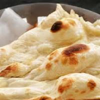 Naan (Indian Flat Bread) · A leavened flatbread often served with Indian cuisine.