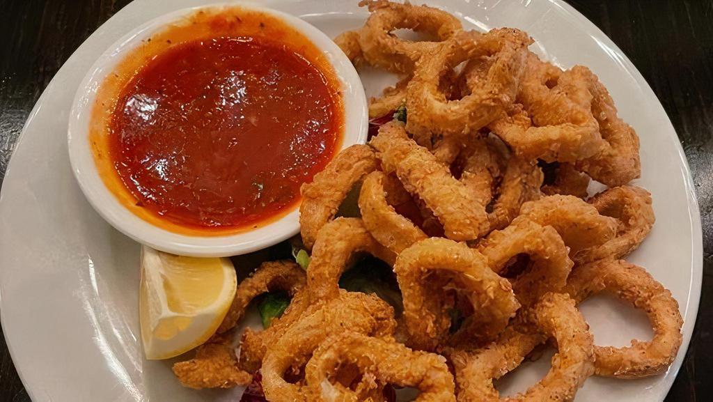Fried Calamari · Served w/ basil pomodoro sauce