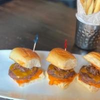 Max'S Special Sliders · three beef sliders served medium topped with 
carmelized onions and house-made romesco sauce...