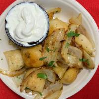 Mini Potato & Cheese Pierogies · Served with sautéed onions & sour cream
