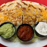 Quesadilla · Flour tortillas with sautéed peppers, onions, tomatoes & Monterey Jack cheese. Served with s...